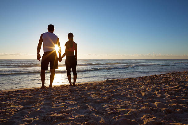 istock Romantic couple watching the sunrise 471475127