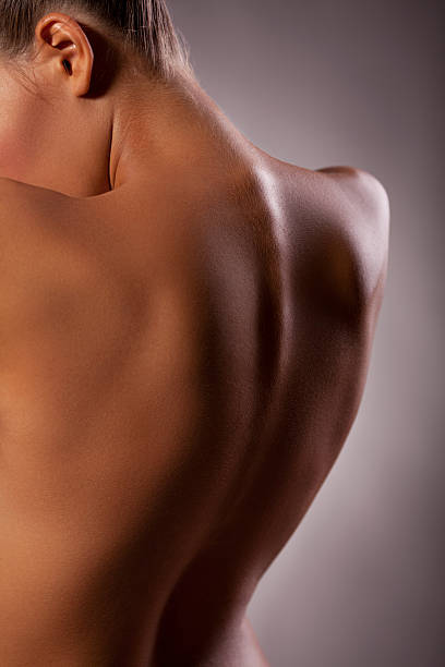 istock Beautiful female back over gray background 471475527