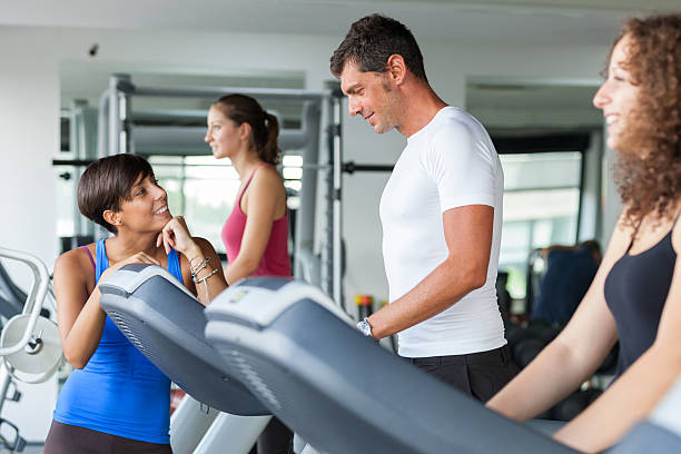 istock People Running on Treadmill in the Gym 471476247