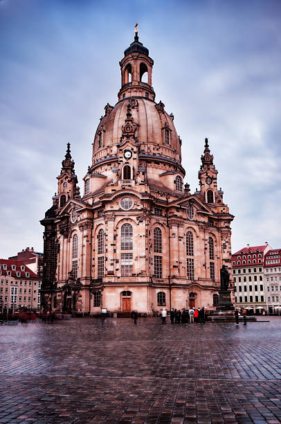 istock Martin Luther statue and Lutheran church in Dresden, Germany 471477771