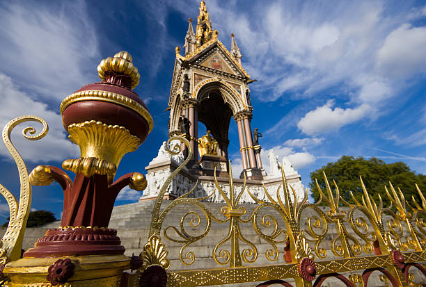 Queen Victoria Memorial, created in 1911 by sculptor Sir Thomas Brock and located in front of Buckingham Palace. Viewed here from the foot of one of the bronze lion sculptures \
