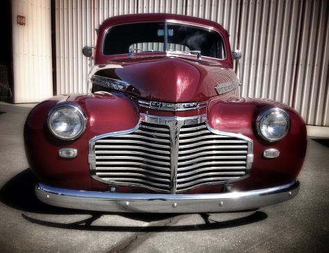 Hollister, California, USA - October 6, 2012: Front view of 1941 Chevrolet Deluxe Sedan. Taken with Apple iphone 5, precessed with Snapseed.