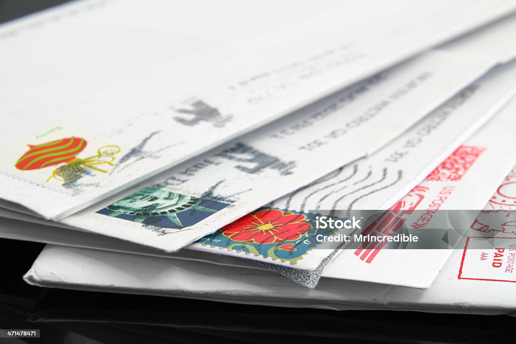US Postage Close up of a stack of old, us letters with postage stamps. Mail Stock Photo