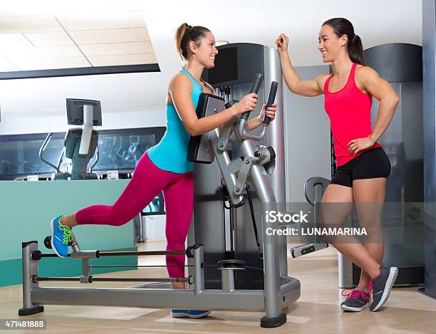 Gym Glute Exercise Machine Woman Workout Stock Photo - Download Image Now - 2015, Activity, Adult