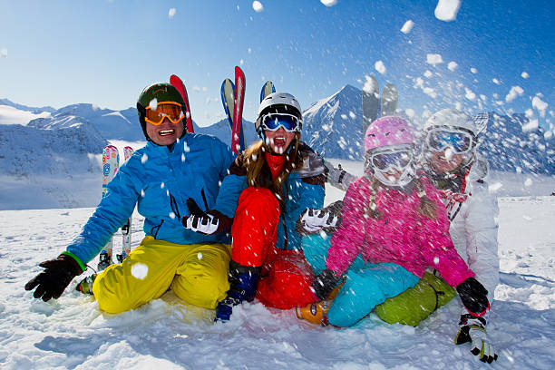 istock Ski family playing with snow 471482109