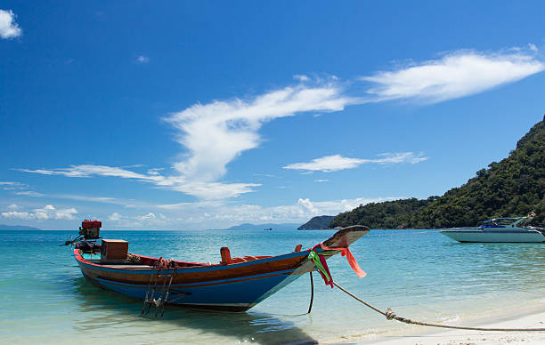 istock Long Tail Boat in Clear Water and Blue sky 471482581