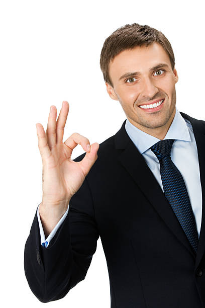 istock Happy smiling young business man with okay gesture 471483127