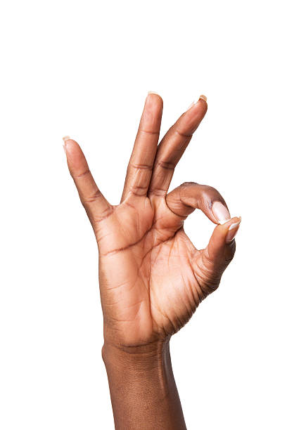 Hand giving "OK" symbol