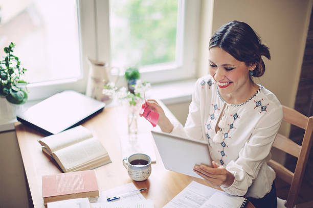 istock Young, latin woman working at home 471484848