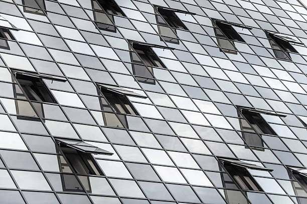 istock Abstract background texture with open windows of modern office building 471485472