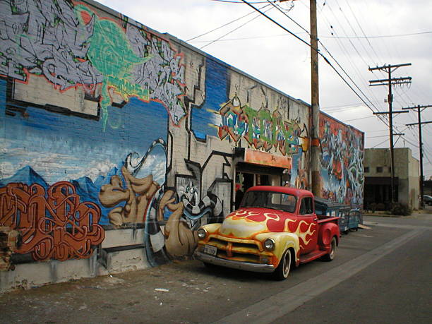 Toronto, Canada - July 5, 2011: Graffiti of text and funky design on side of delivery lorry in side street in downtown Toronto.