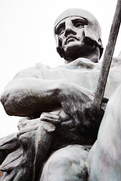 Statue of Knight in armour against white background, copy space