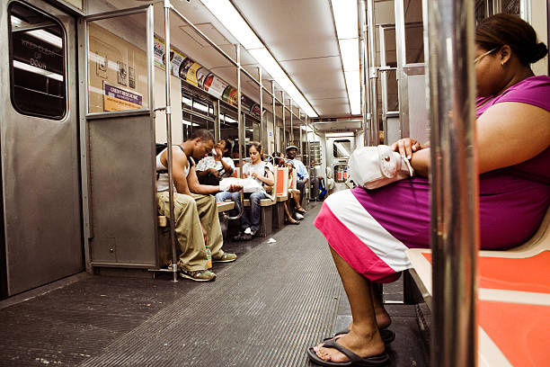 Philadelphia, Pennsylvania, USA - July 16, 2008: People sit inside of a SEPTA subway car on the Broad Street line to south Philadelphia.