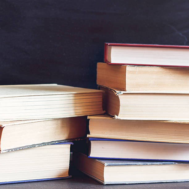 istock Books On Wooden Desk. 471489608