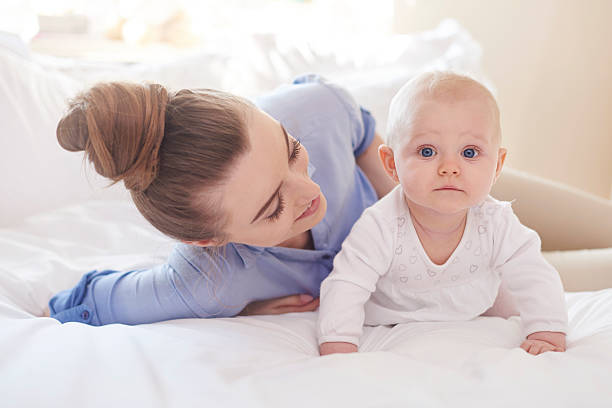 istock Spending time with mommy in bed 471490070