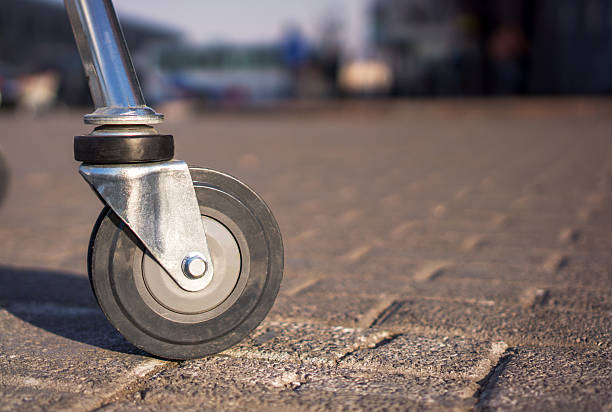 istock wheel of shopping cart 471490366