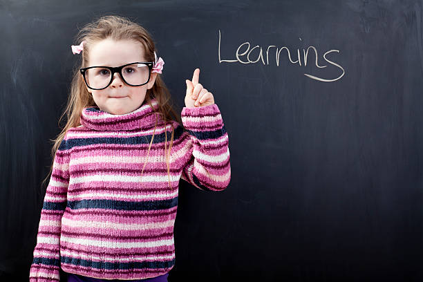istock Cute girl says that learning is important 471493293