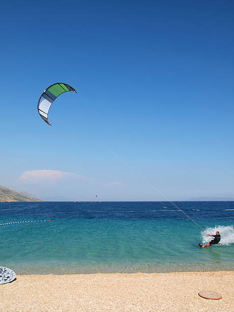 カイトサーフィン - kiteboarding sunlight croatia dalmatia ストックフォトと画像