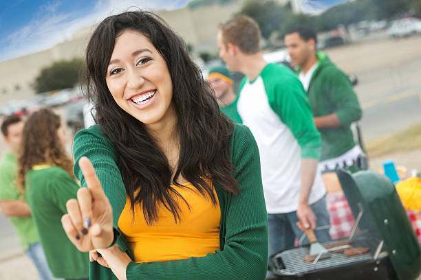 istock College football fan holding up 