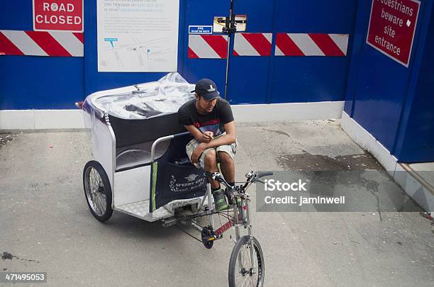 Bicycle Rickshaw Driver Taking Quick Smoke Break Stock Photo - Download Image Now - Bicycle, Blue-collar Worker, Coffee Break