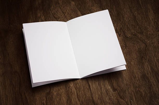 istock Blank brochure on a dark wooden background 471495495