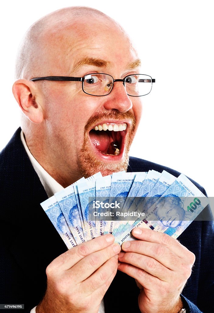 Guarda cosa ho fatto! Overjoyed uomo con molte delle banconote di grosso taglio - Foto stock royalty-free di Adulto