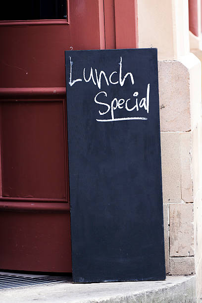 istock Blackboard with sign 'Lunch special' front of restaurant, copy space 471496757