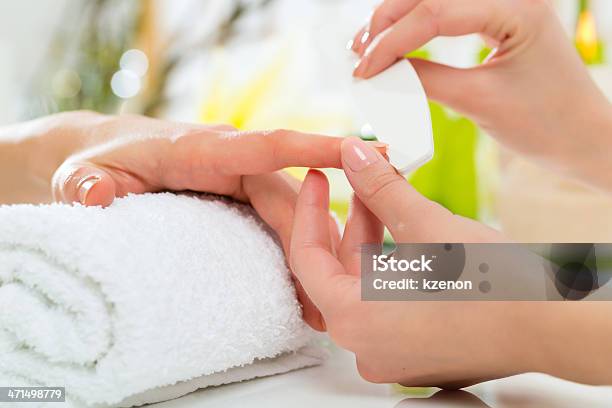 Woman In Nail Salon Receiving Manicure Stock Photo - Download Image Now - Adult, Adults Only, Beautician