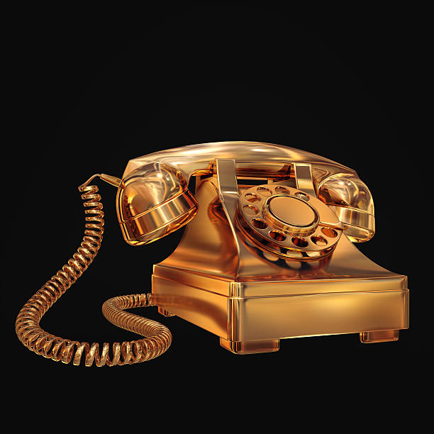 istock Golden phone on black isolated background. 471500308