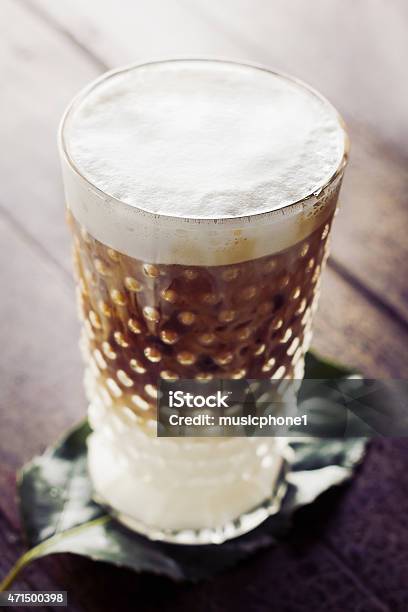 Frothy Layered Cappuccino In A Clear Glass Mug Stock Photo - Download Image Now - 2015, Black Color, Breakfast