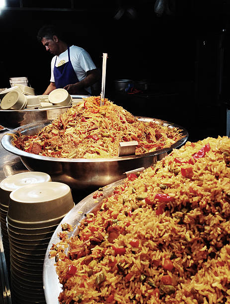 Nosara, Costa Rica - April 15, 2013: a man prepares food for sale at a local rodeo