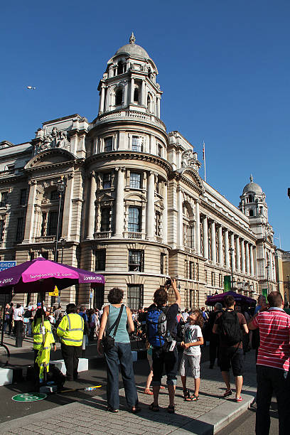 olympic torch relay in trafalgar square, london - olympic torch stock-fotos und bilder