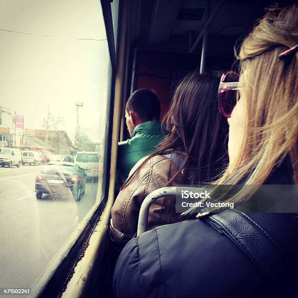 Mirando A Través De La Ventana Foto de stock y más banco de imágenes de Adulto - Adulto, Anticuado, Avenida