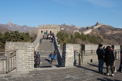 Badaling, China - November 18, 2011: Great wall of China. Tourists visiting the famous site and admiring the beautiful location.