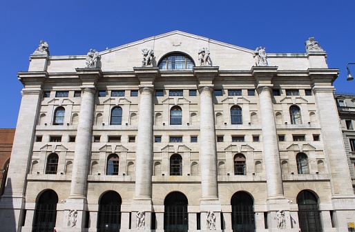 Milan, Italy - April 10, 2010: Facade of Mezzanotte Palace, home of the Italian Stock Exchange building in Milan, Italy