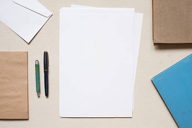 istock Empty stationary set up with papers, pens, and envelopes 471503580