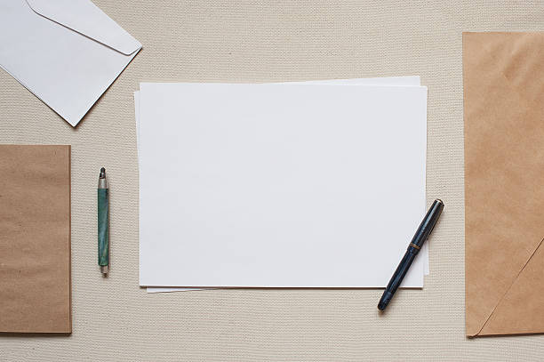 Empty envelopes and sheets of paper on the table