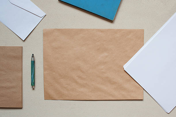 istock Empty envelopes and sheets of paper on the table 471504726
