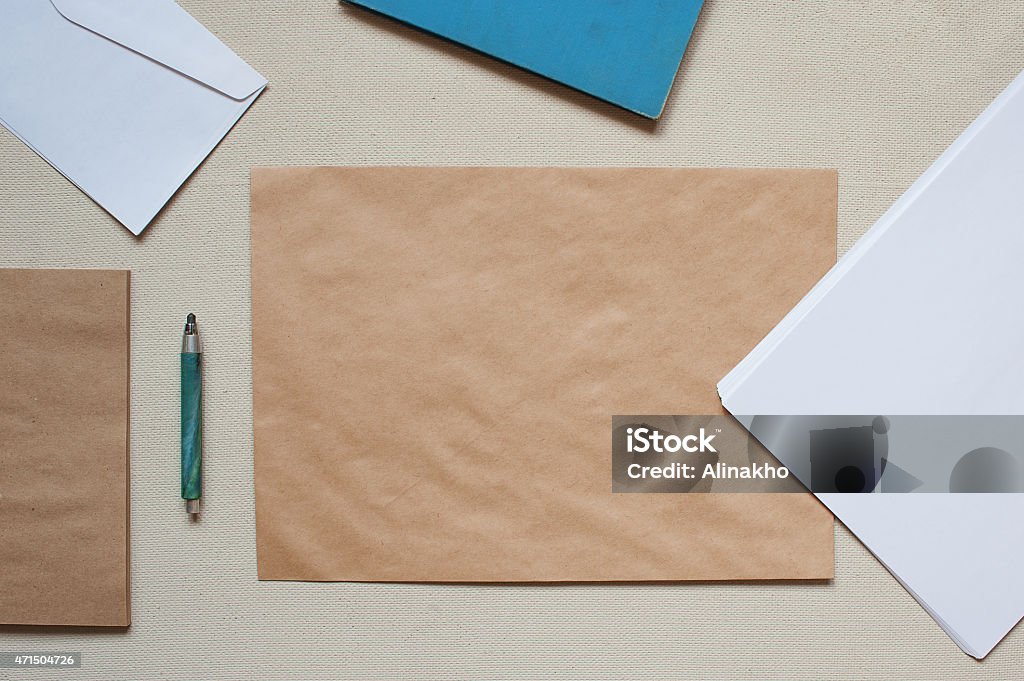 Empty envelopes and sheets of paper on the table 2015 Stock Photo