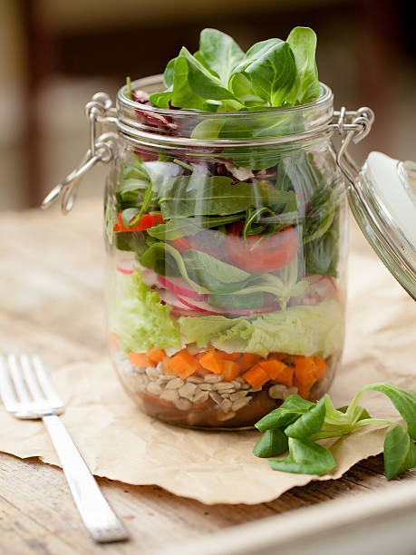 Lunch "to go" in glass jar stock photo