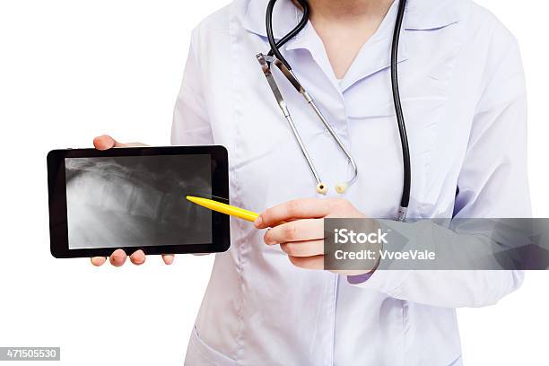 Nurse Points On Tablet Pc With Vertebral Column Stock Photo - Download Image Now - 2015, Computer Monitor, Cut Out