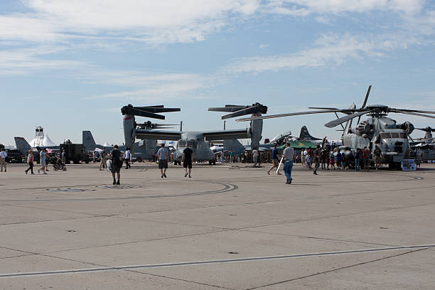 Airshow Crowd And Displays San Diego, United States- September 30, 2011:  This image shows people looking at the aircraft on display at the Marine Corps Air Station Miramar Airshow. 2011 marks 100 years of naval aviation. miramar air show stock pictures, royalty-free photos & images