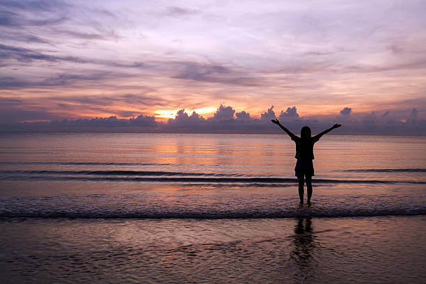 istock Woman in Sunrise 471506851