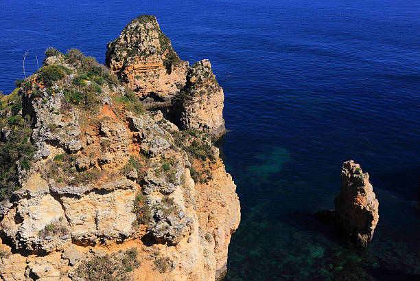 istock Beautiful cliff formations, Atlantic Coast, Lagos, Western Portugal. 471507676