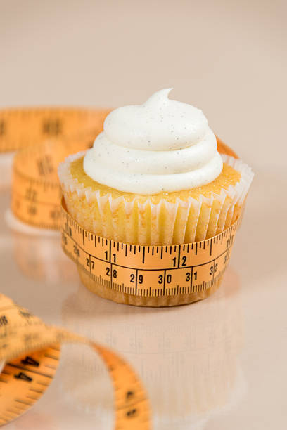 istock Healthy Cupcake with MEasuring Tape 471508256
