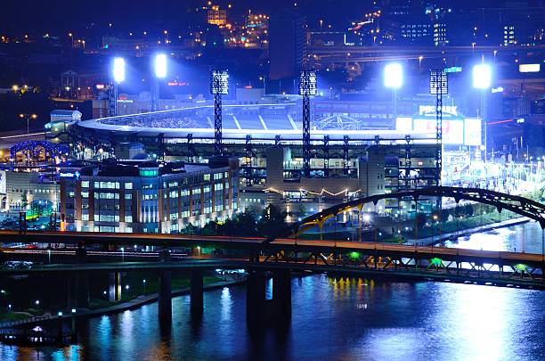 PNC Park Pittsburgh, Pennsylvania, USA - August 7, 2012: Exterior of PNC Park and the Roberto Clemente Bridge. Opened in 2001, it is the 5th home of the Pirates. major league baseball stock pictures, royalty-free photos & images