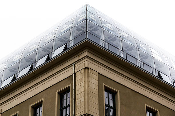 Domed round roof buildung with outdoor café in Berlin, at the intersection of Kant and Jochimstaler streets.
