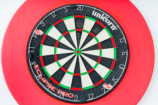 Shanghai, China - May 4, 2013: Close-up view of a Unicorn Eclipse Pro Dartboard, which is used in PDC World Championship Darts. Unicorn is a world leading manufacturer of darts equipment. And this type of dartboard is one of its best. 