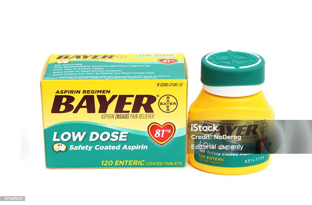 Bayer de ácido acetilsalicílico en dosis bajas - Foto de stock de Amarillo - Color libre de derechos
