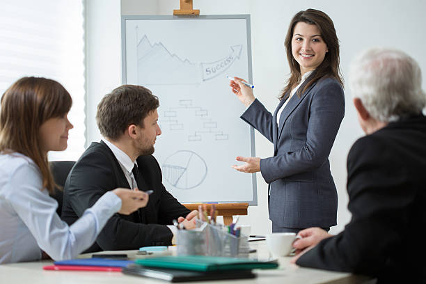 istock Analyzing company success during business conference 471509550